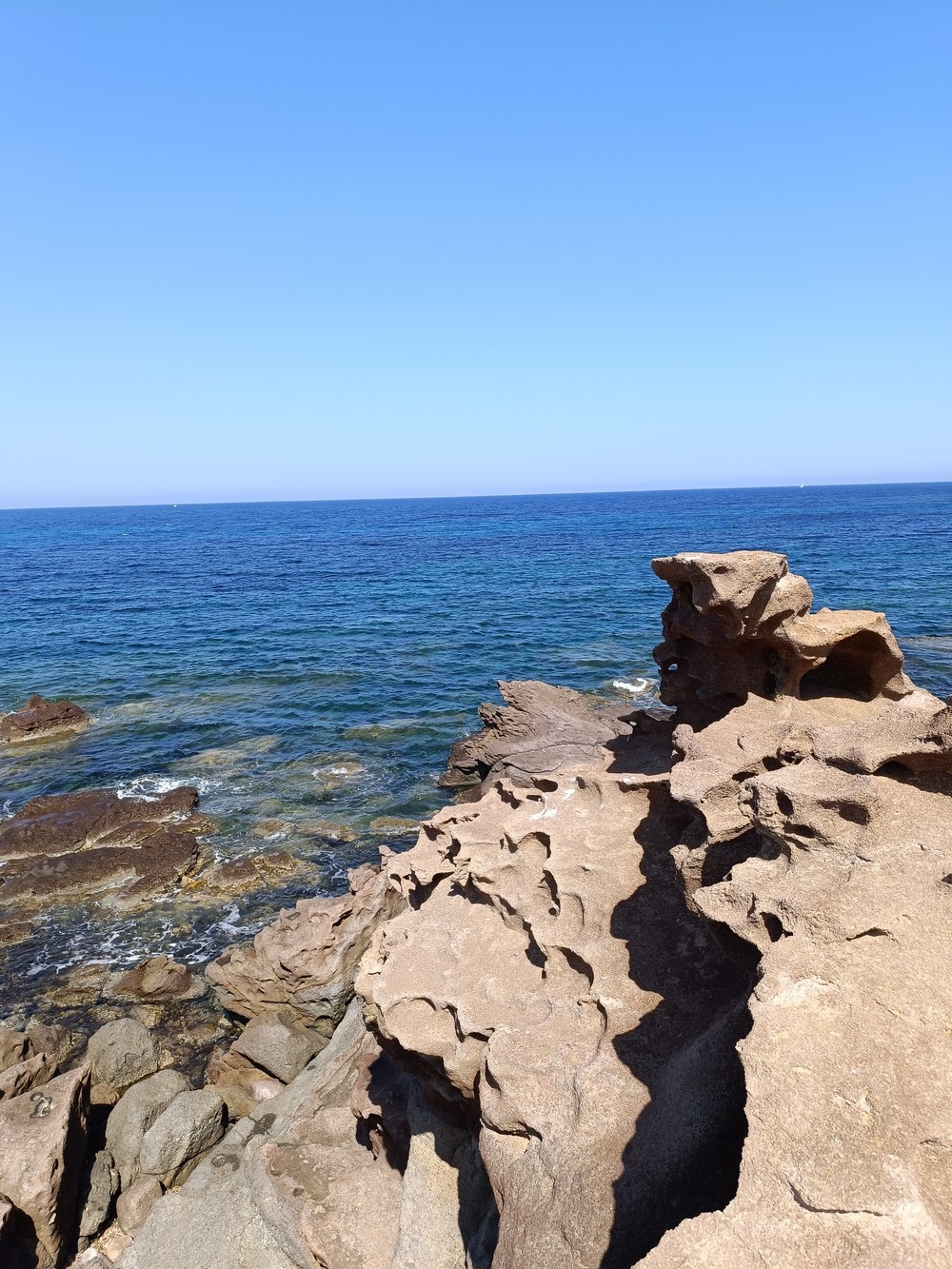 The coast and the rocks by N/A